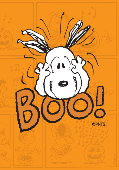 Illustration of Snoopy with ears raised, playfully scaring with the word “BOO!” on an orange background featuring faint Peanuts Halloween comic panels.