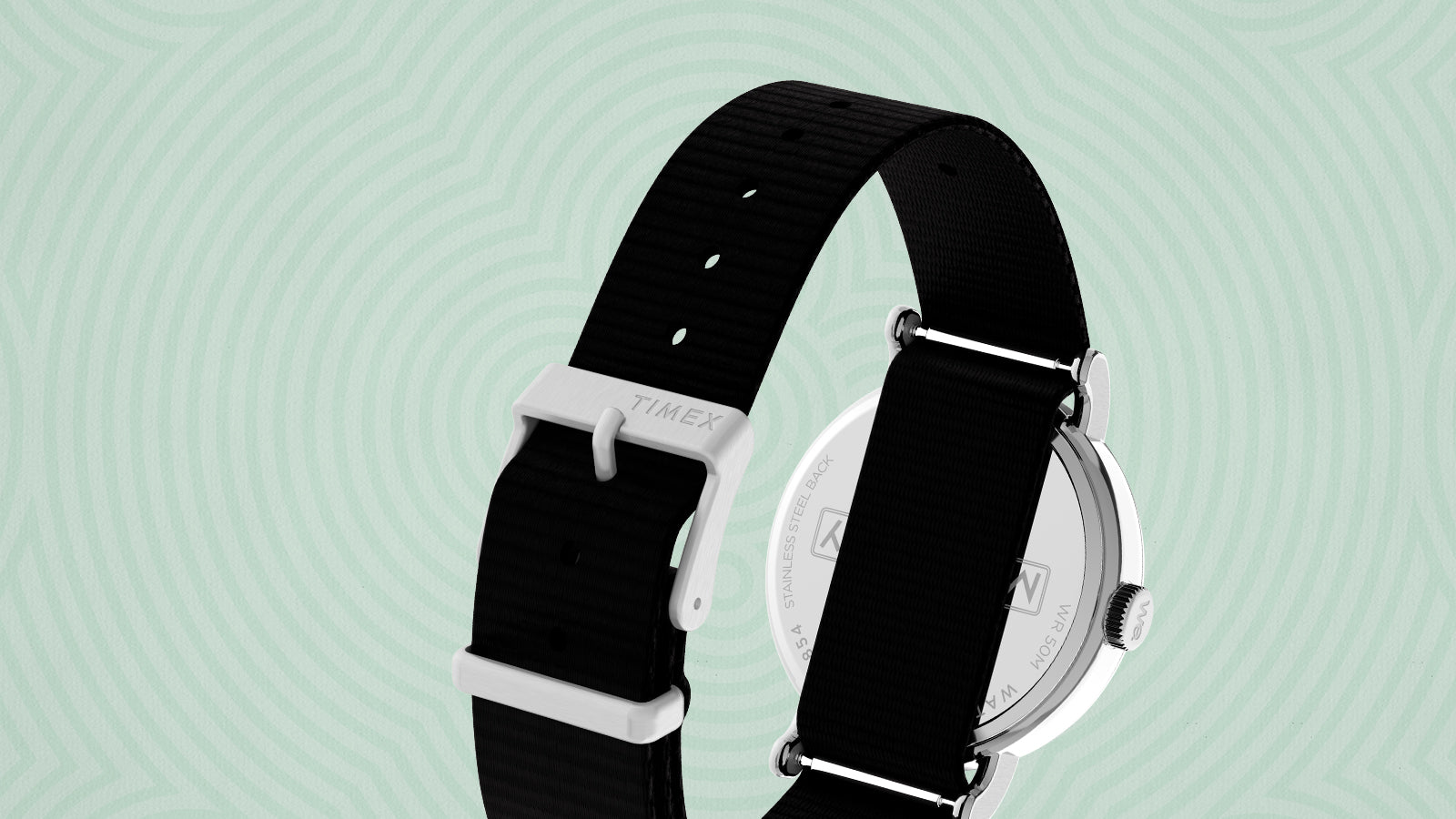 Rear view of the Timex x Monopoly Weekender wristwatch, showing the stainless-steel case back engraved with Timex branding and the durable black nylon strap with silver buckle.