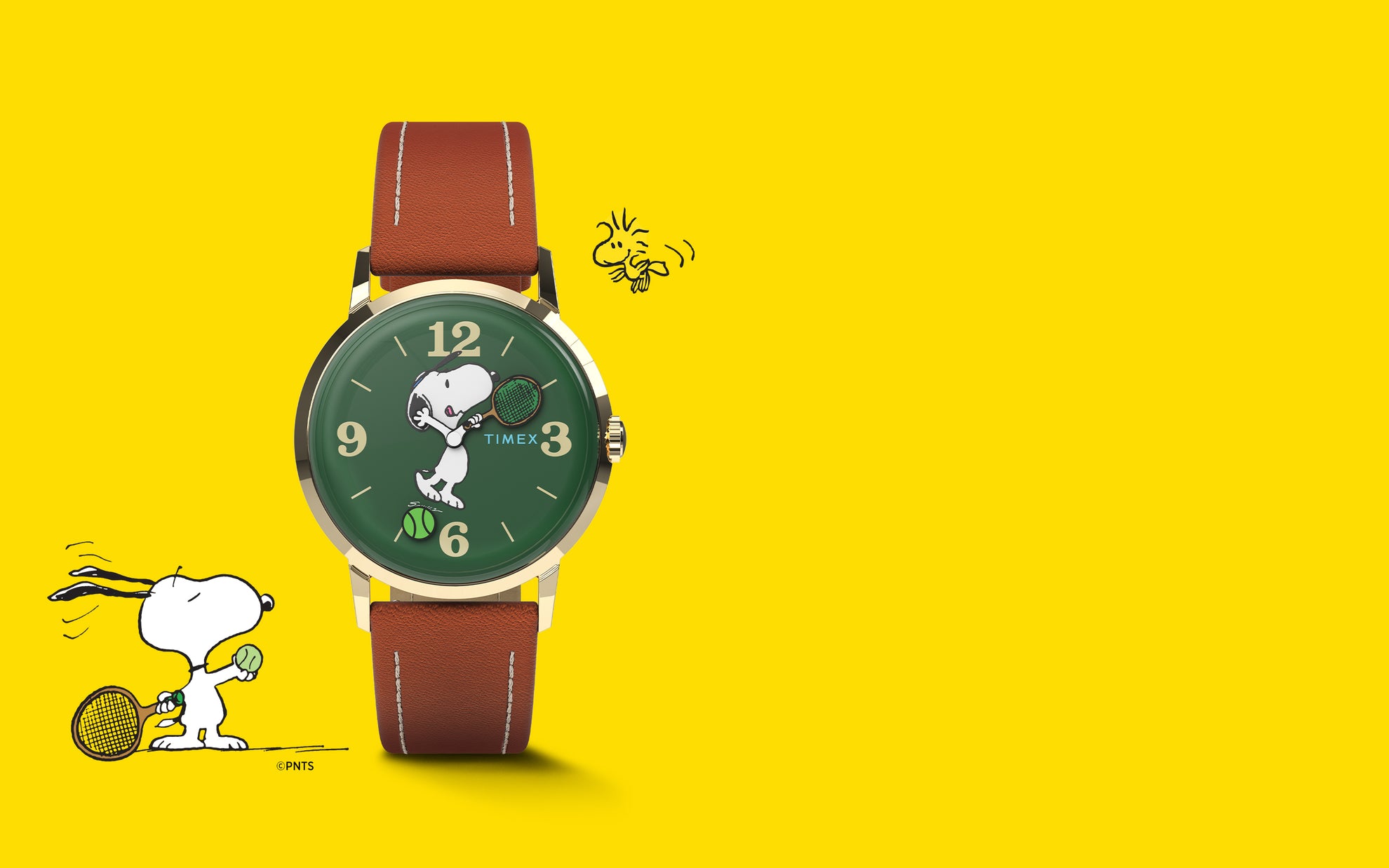 Peanuts® x Timex Marlin® Hand-Wound watch with Snoopy playing tennis on a green dial, gold-tone case, and brown leather strap, set against a bright yellow background with Snoopy and Woodstock illustrations.
