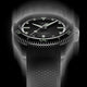 Front view of the Timex Atelier automatic dive watch with black dial, luminous indices, and black textured rubber strap, designed for mobile display.