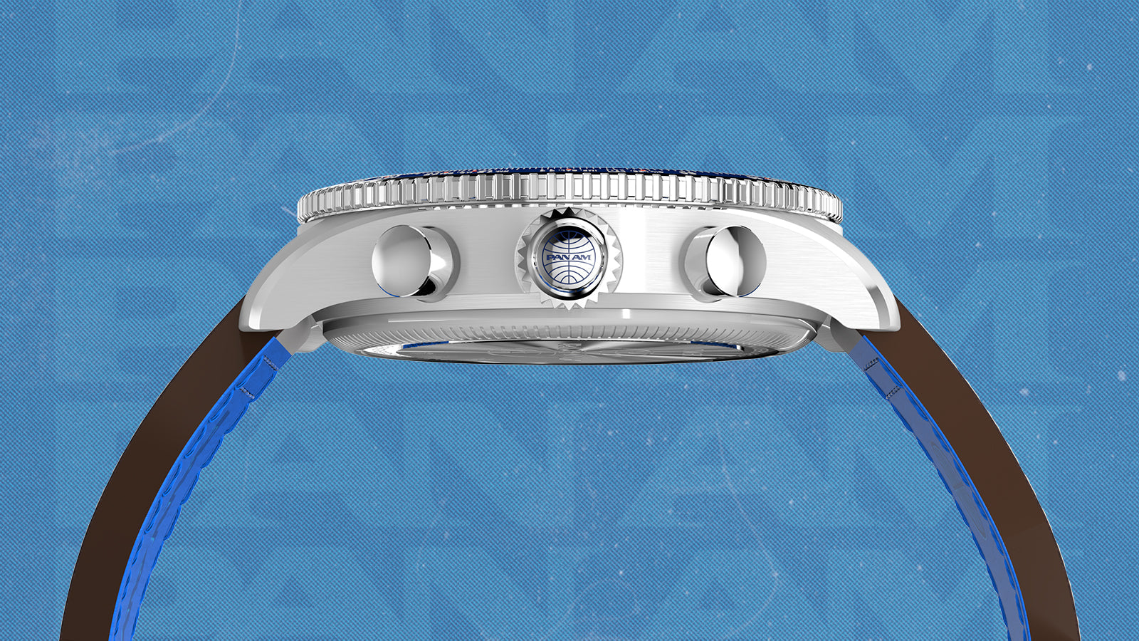 Side profile of the Timex x Pan Am® Fly-Back Chronograph highlighting the brushed stainless-steel case, crown with Pan Am logo, and chronograph pushers. The image shows the curved crystal and overall sleek build of the watch against a blue textured background.