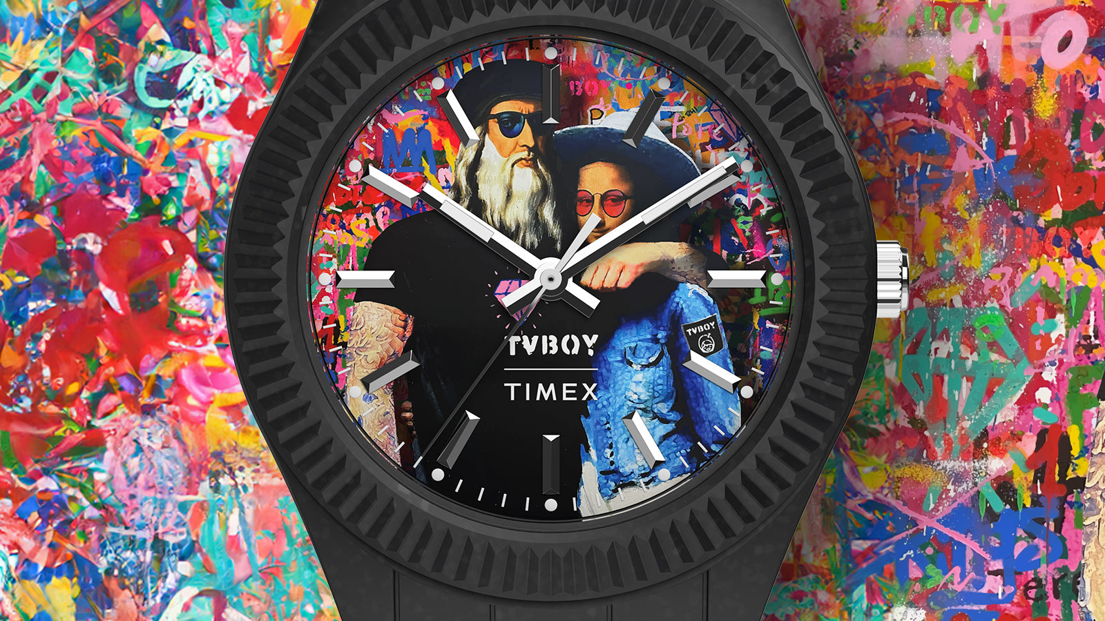 Detailed macro shot of the Timex Legacy Ocean x TVBOY watch face showing the art design by TVBOY featuring two contemporary figures over a graffiti-inspired backdrop. The image emphasizes Timex and TVBOY branding on the dial.