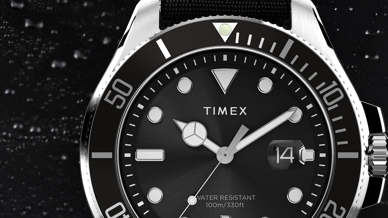 Close-up of the TIMEX® Harborside Coast watch face with black dial, silver-tone hands, and magnified date window at 3 o’clock.
