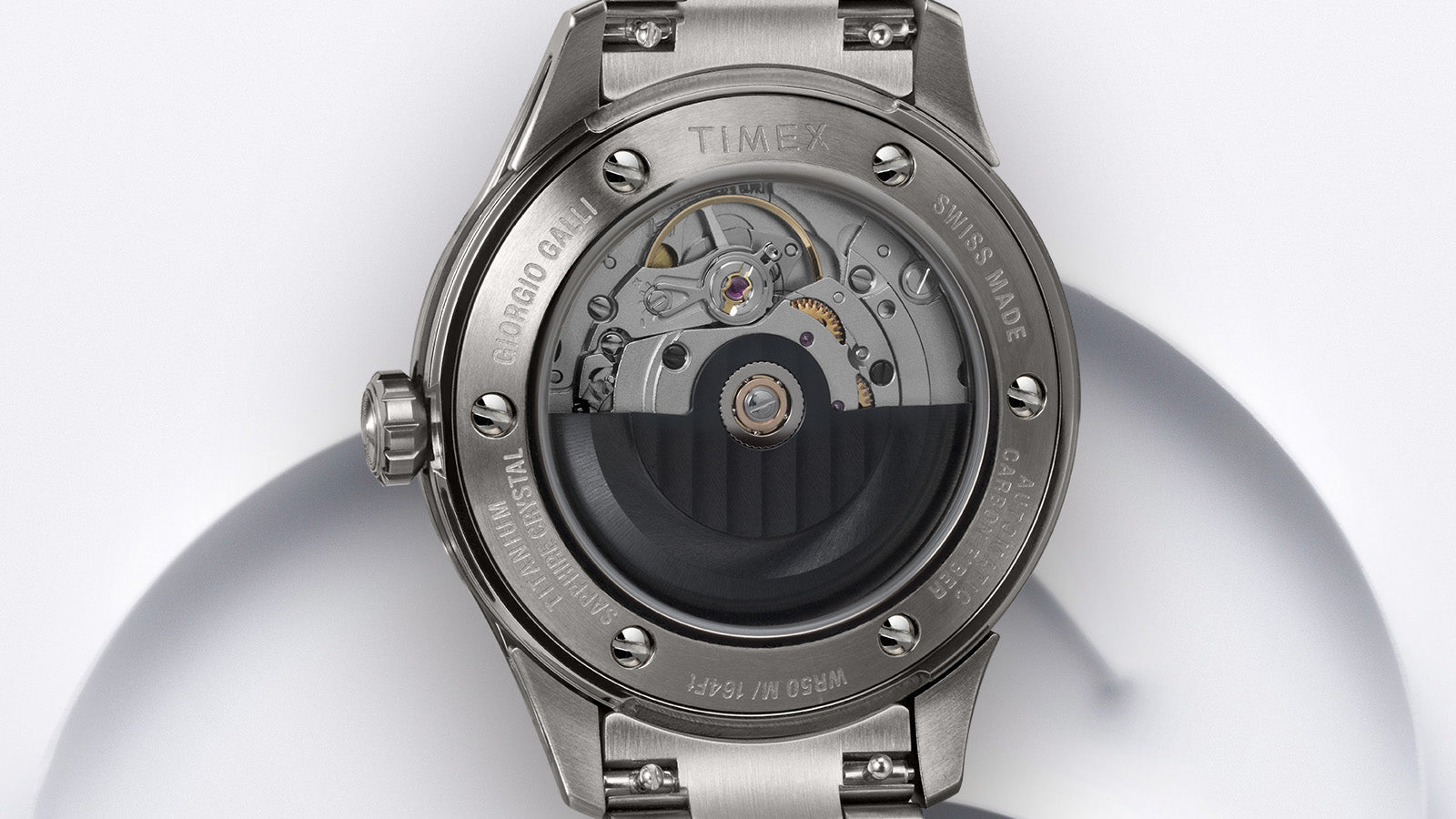 Close-up of the case back of the Timex Giorgio Galli S2Ti watch, showing the automatic Swiss movement through the exhibition case back engraved with ‘Timex’ and ‘Swiss Made’.