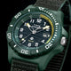 Timex Expedition® Freedive Solar watch with green resin case, black dial, yellow accents, and 50-meter water resistance on dark background.
