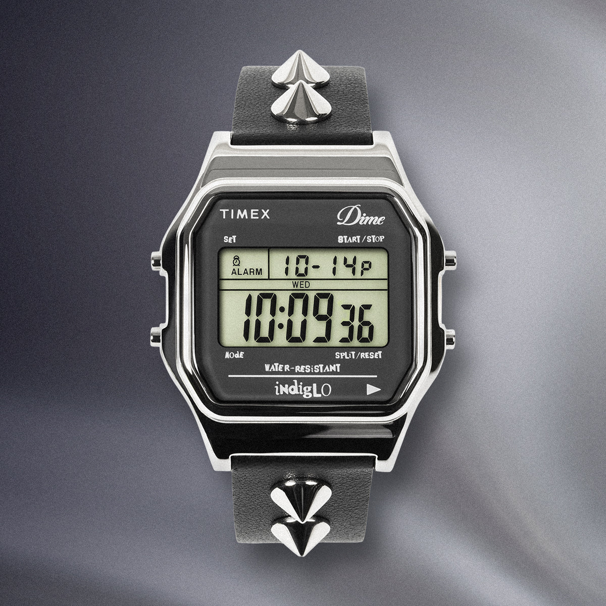 Timex x Dime digital watch with black studded leather strap and LCD display.
