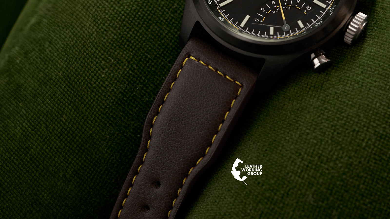 Brown leather strap detail of Timex Waterbury Ace Fly-Back Chronograph with contrast stitching and Leather Working Group logo