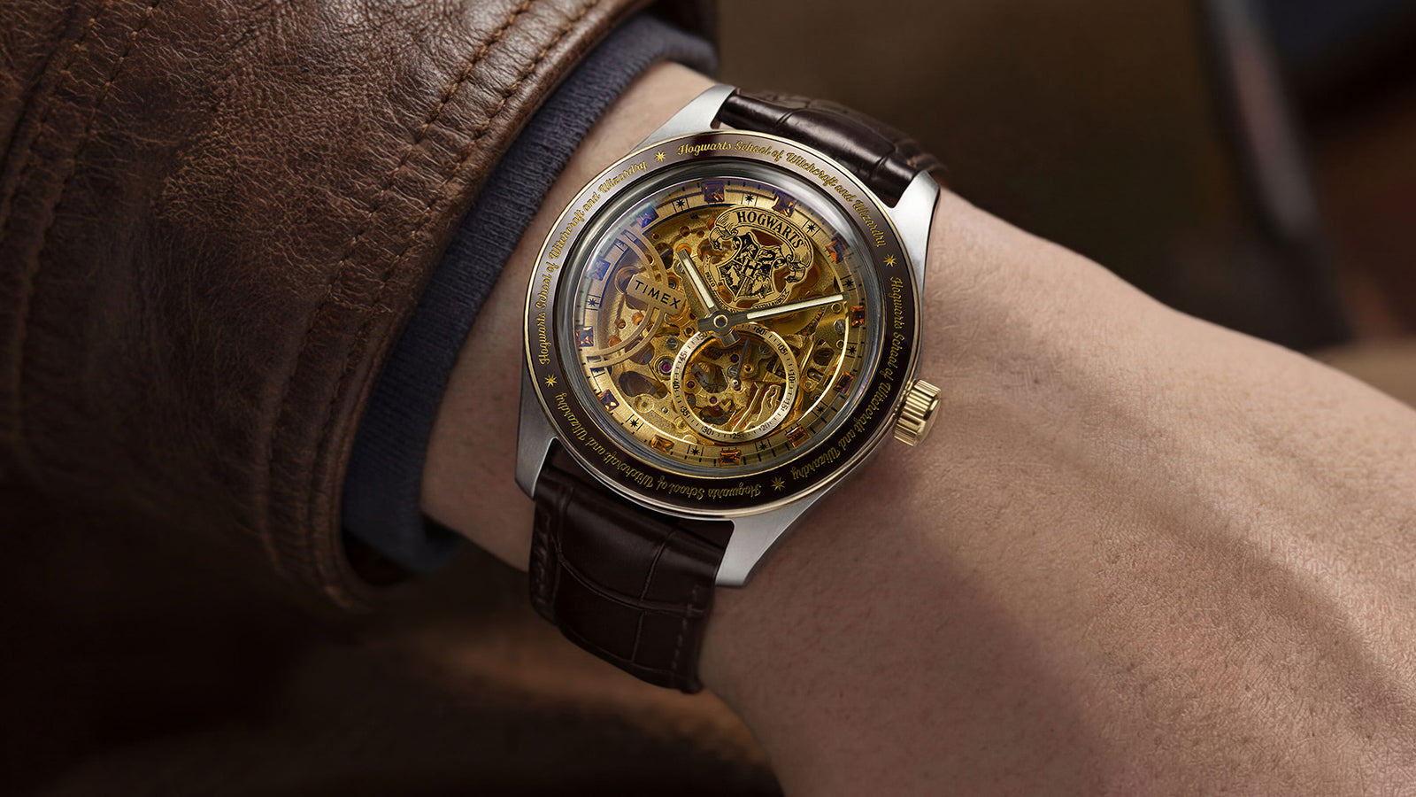 On-wrist view of Harry Potter x Timex Waterbury Skeleton Automatic with brown leather strap and stainless steel case.