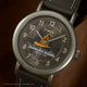 Close-up of Harry Potter x Timex Weekender Sorting Hat dial with Hogwarts School text and detailed Sorting Hat illustration.