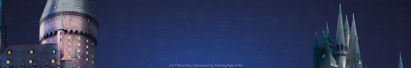 Nighttime view of Hogwarts castle towers under a starry sky, with softly lit windows and a magical blue-toned background.