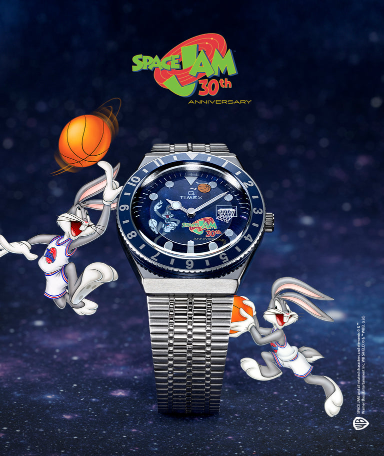 Space Jam x Timex Q 30th Anniversary Limited Edition watch showcasing stainless steel bracelet, rotating bezel, Bugs Bunny basketball dial, and glow-in-the-dark details against a space-themed background