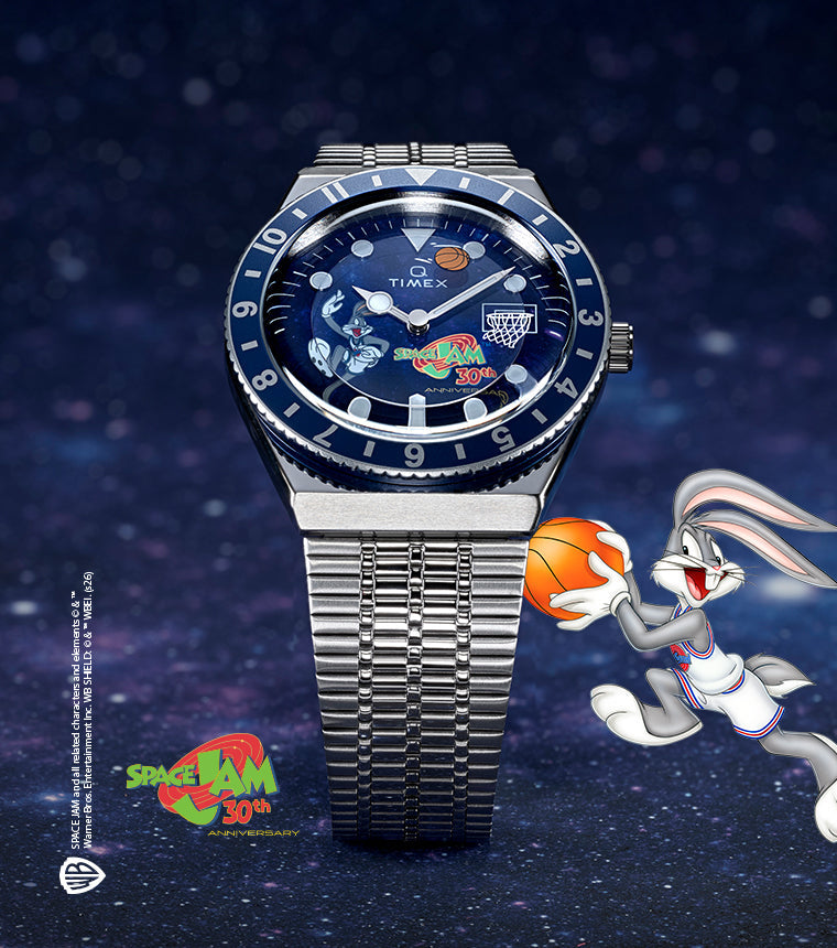 Space Jam x Timex Q 30th Anniversary Timex Q watch with Bugs Bunny dribbling a basketball beside the stainless steel bracelet watch on a cosmic background
