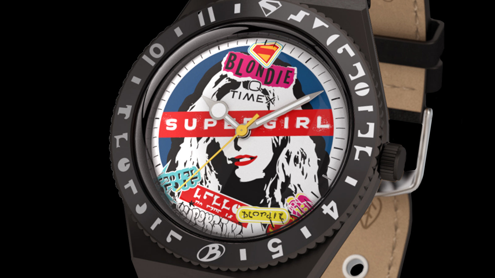 Detailed close-up of the Supergirl x Blondie Q Timex watch face, showcasing the Blondie portrait dial, layered sticker-inspired artwork, and custom bezel markings inspired by Kryptonian-style symbols.