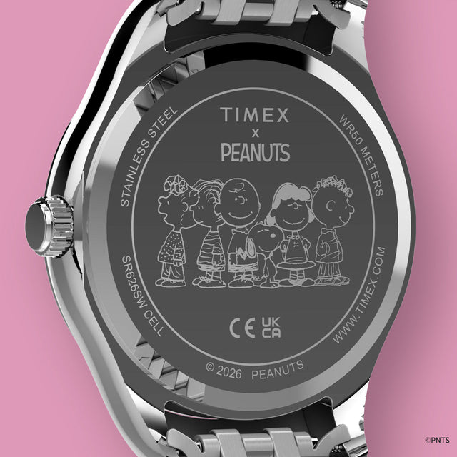 Caseback of the Peanuts® x Timex Legacy Snoopy Umbrella watch featuring an engraved Peanuts group illustration and Timex x Peanuts branding.