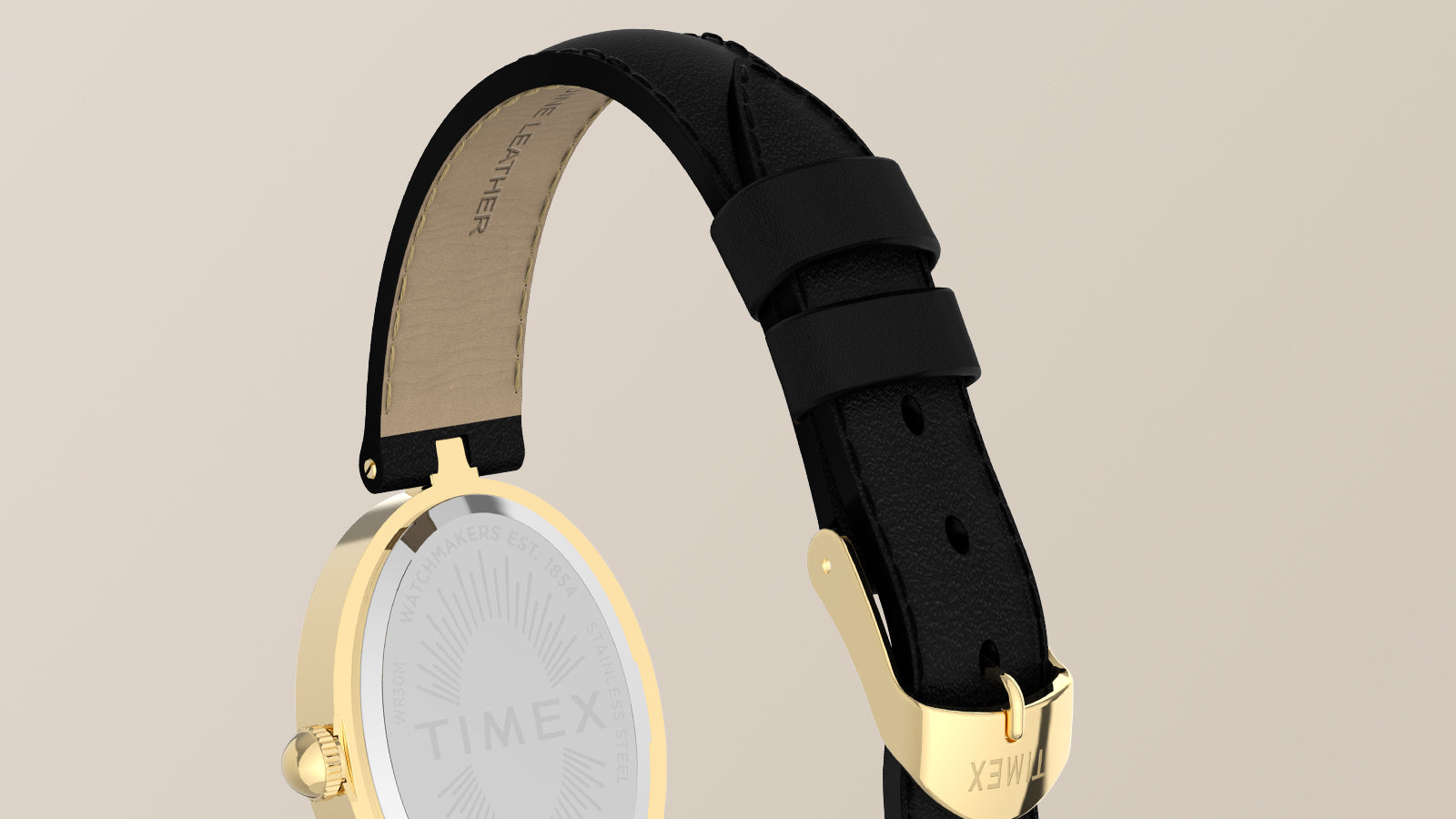 Close-up of the Timex Cavatina® Luxe black leather strap with a gold-tone buckle and polished gold-tone case back.