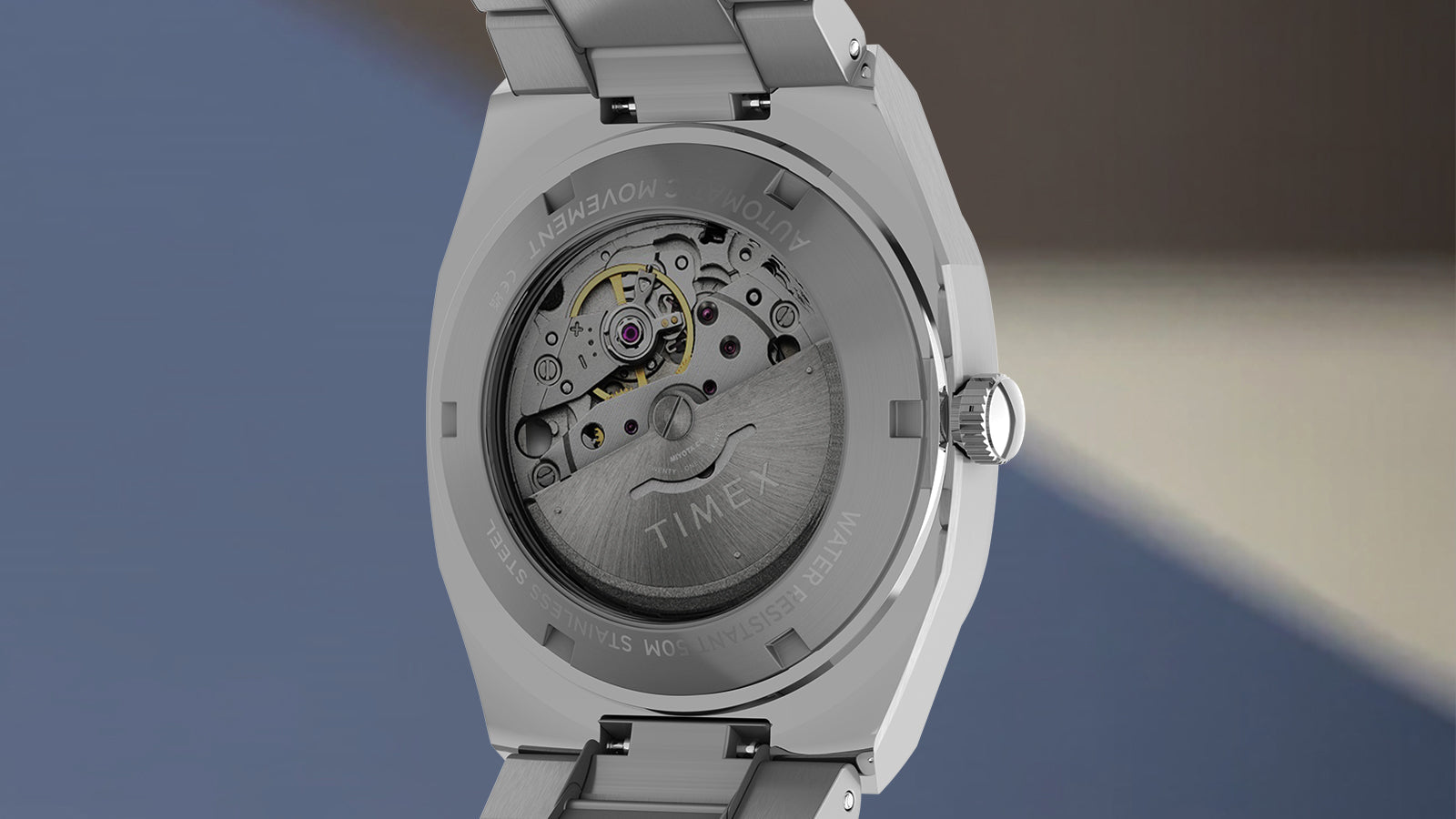 Rear view of the Timex® Automatic E Line 38mm showcasing the exhibition caseback and visible automatic mechanical movement through the transparent crystal.