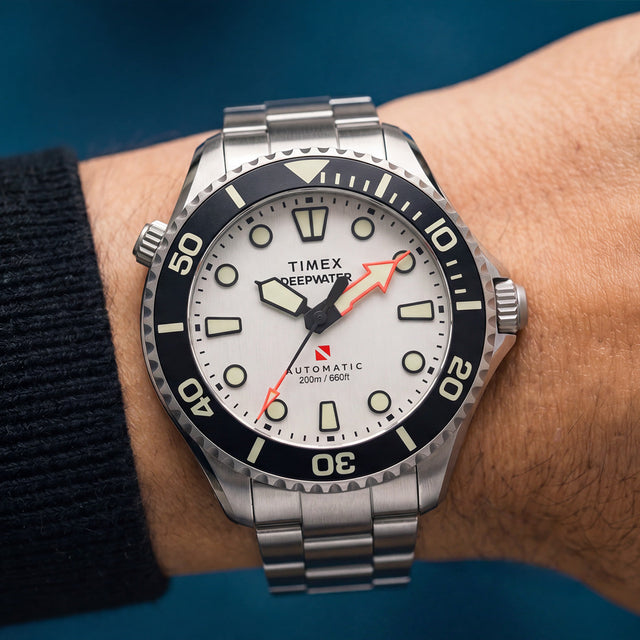 Deepwater Meridian 200 HEV Automatic with a silver-tone dial, black bezel, and stainless-steel bracelet worn on the wrist.