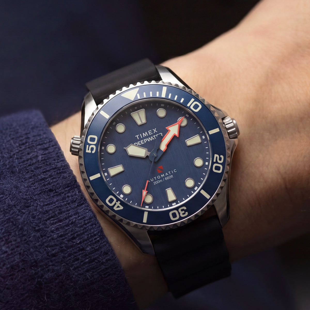 Deepwater Meridian 200 HEV Automatic with a blue dial, blue bezel, and black rubber strap worn on the wrist.