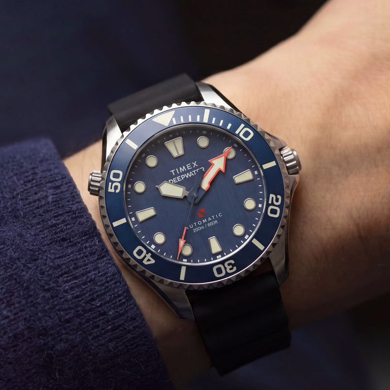 Deepwater Meridian 200 HEV Automatic with a blue dial, blue bezel, and black rubber strap worn on the wrist.