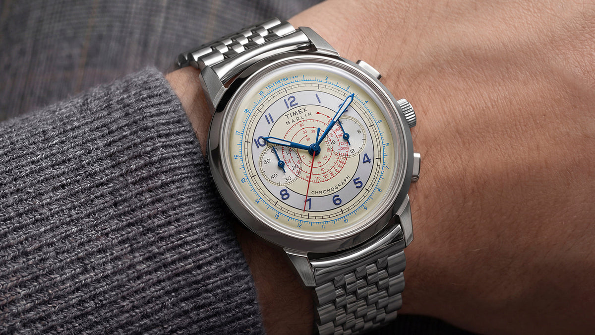 Marlin® Neo Classic Chronograph worn on a wrist, featuring a cream multiscale dial and stainless-steel bracelet.