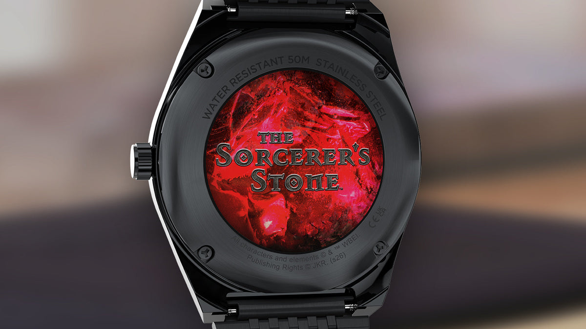 TW2Y99700 Caseback of the Harry Potter x Q Timex watch featuring a red graphic with ‘The Sorcerer’s Stone’ lettering.
