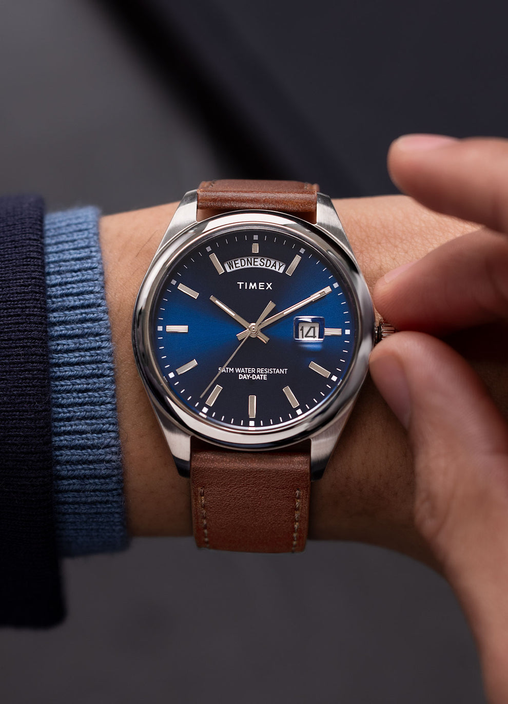 Timex Legacy Blue Dial Leather Strap Watch in a Wrist.