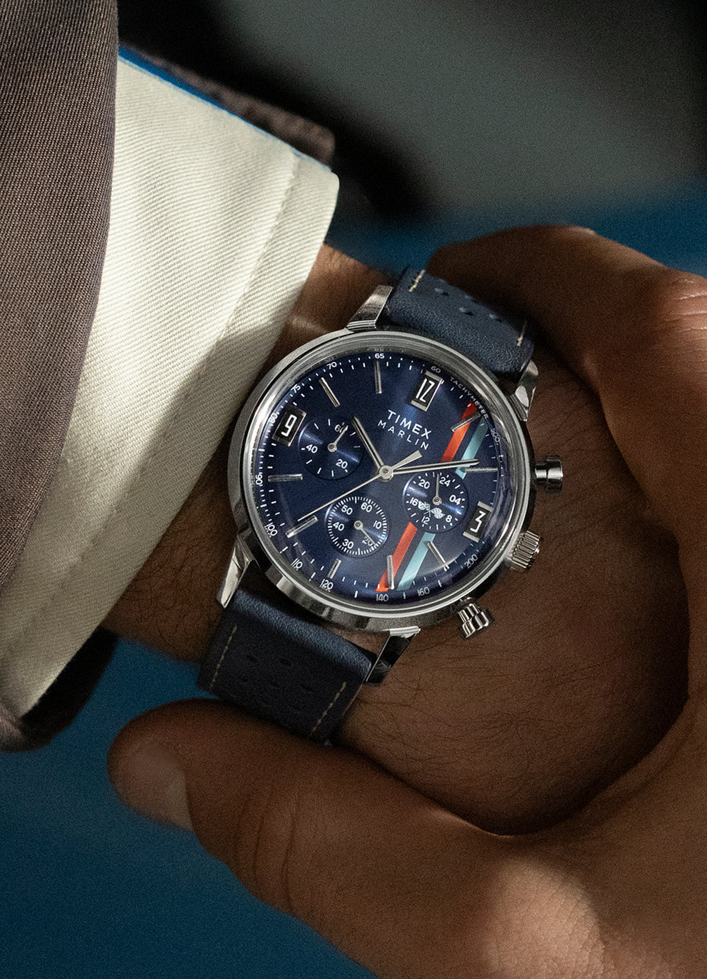 Marlin® Chronograph 40mm Blue Leather Strap Watch with sub-dial decorated with the checkered flags worn by a man on his wrist