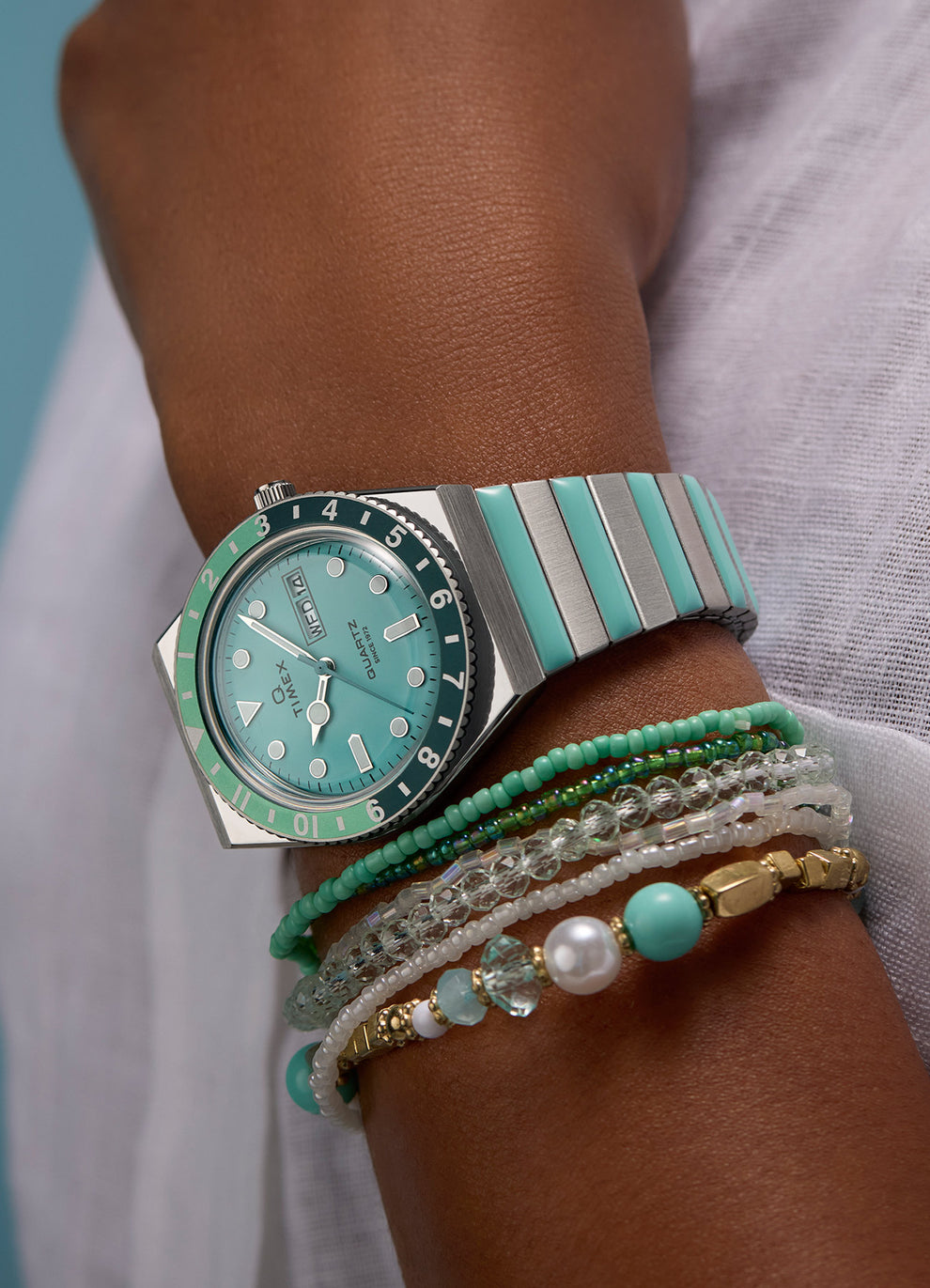 Women's Q Silver tone Case and Bracelet with Teal Accents