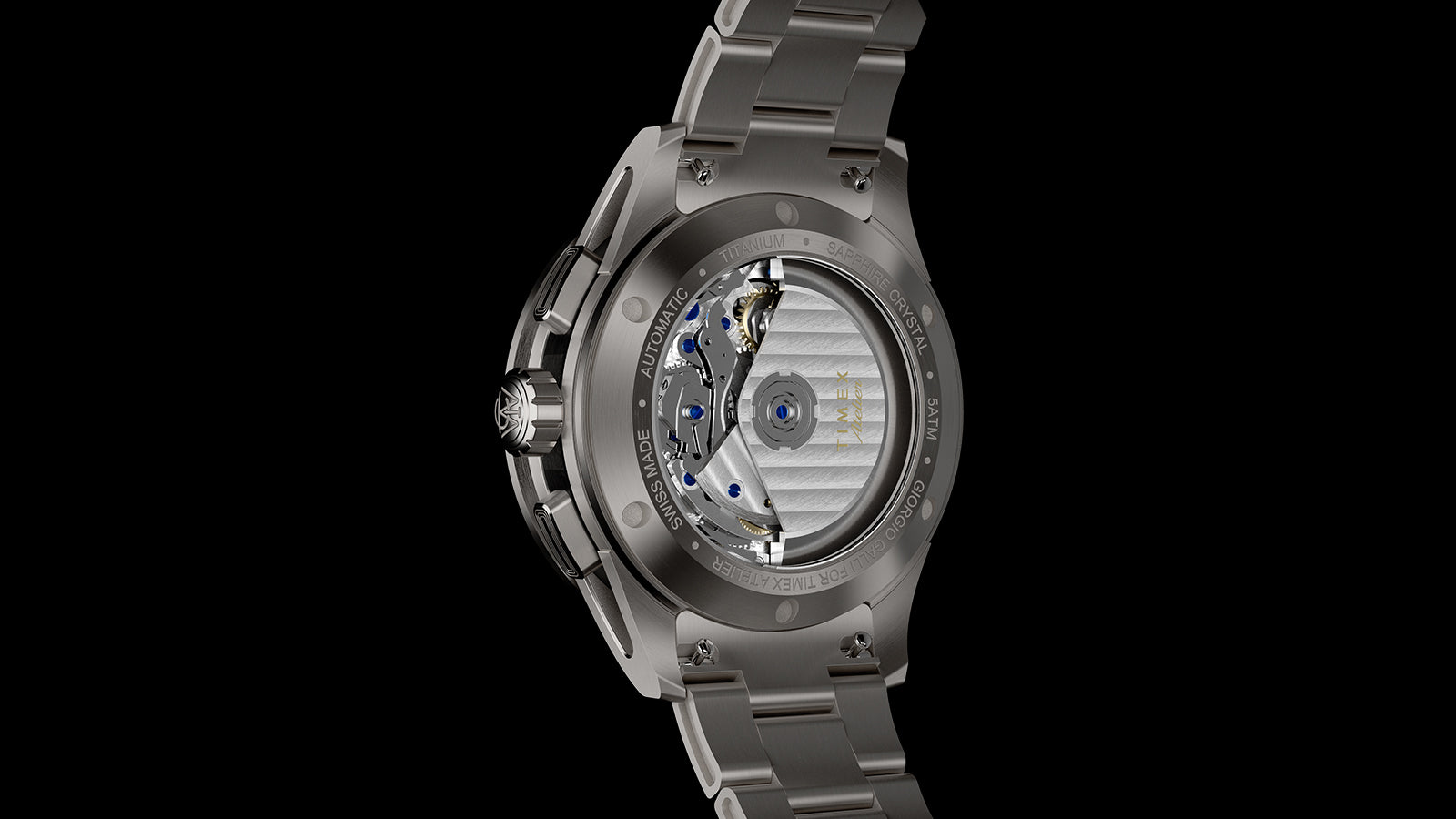 Exhibition caseback of Timex Atelier Chronograph Automatic Ti M1a showing Swiss automatic movement and rotor