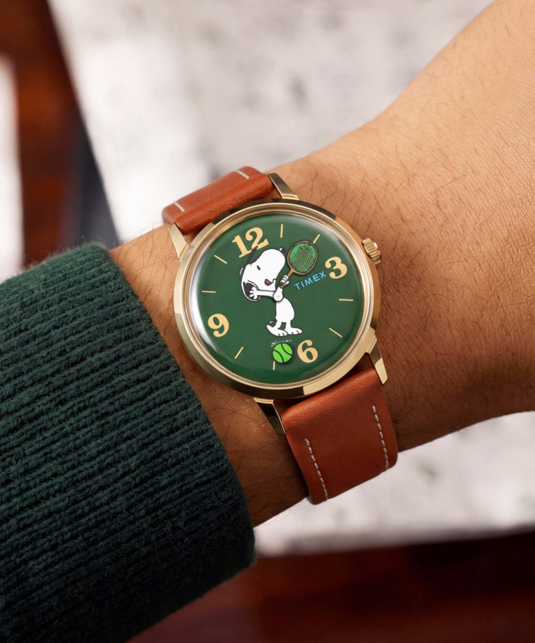 TW2V88800 Peanuts® x Timex Marlin® Hand-Wound Snoopy Tennis 34mm Leather Strap Watch Primary Wrist Image
