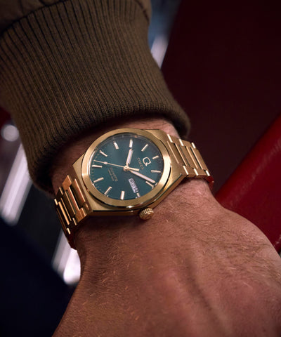 TW2Y35100 Q Timex® Continental Day and Date 39mm Stainless Steel Bracelet Watch Primary Wrist Image