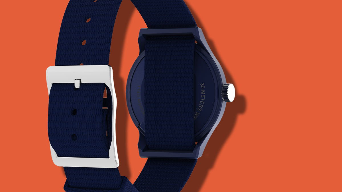 TW6A31000 Rear view of the Pop & Miffy by Timex MK1 watch, showing its navy fabric strap, silver-tone buckle and case back.