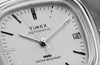 Video showcasing the Timex® Automatic 1983 E Line Reissue watch, highlighting its vintage-inspired design, gold-tone case, and automatic movement details through close-up shots and lifestyle scenes.