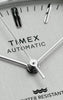 Video showcasing the Timex® Automatic 1983 E Line Reissue watch, highlighting its vintage-inspired design, gold-tone case, and automatic movement details through close-up shots and lifestyle scenes.