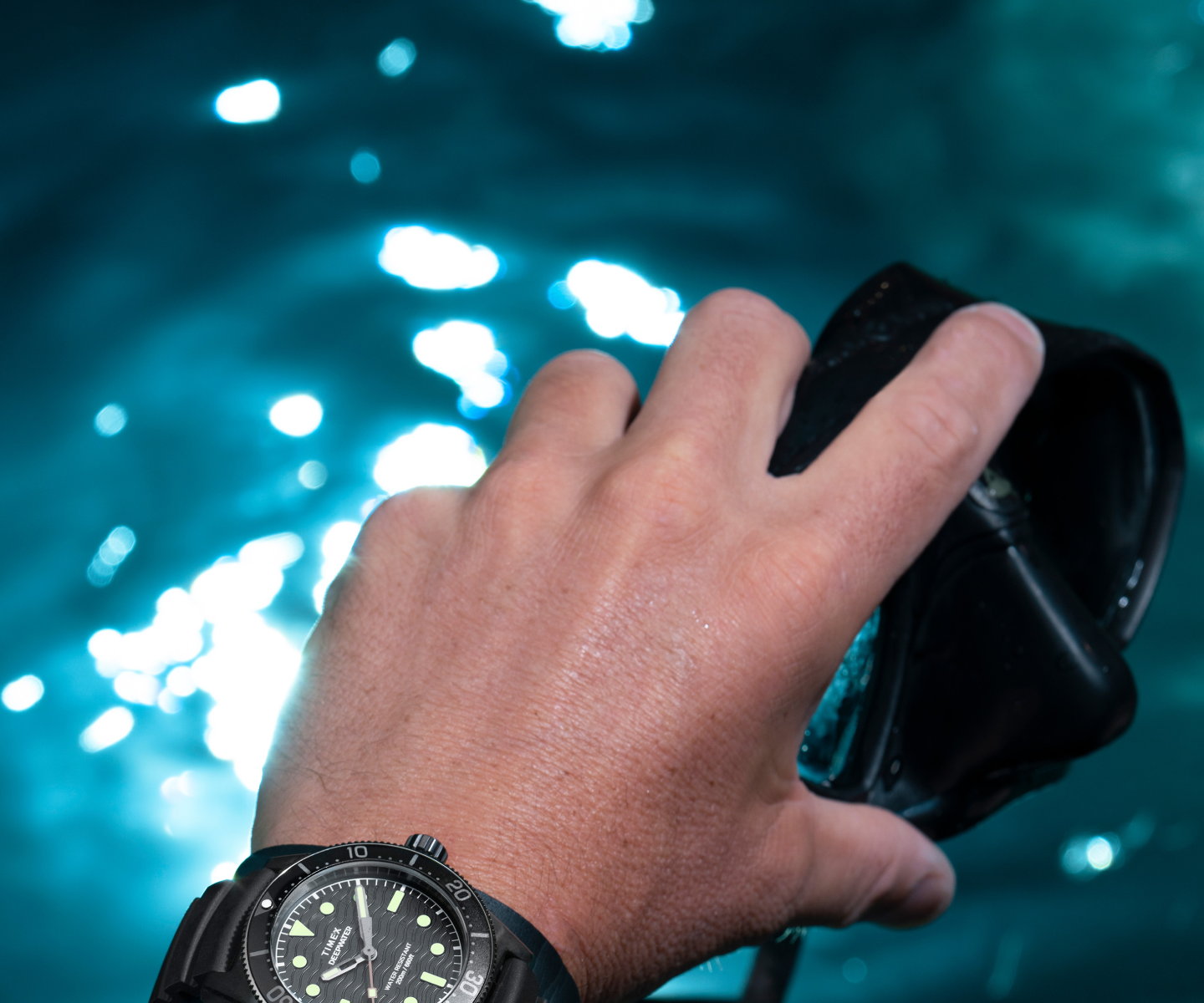 An image of a Diver while wearing a Timex Deepwater watch